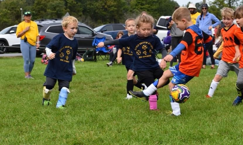 Kindergartneners playing soccer