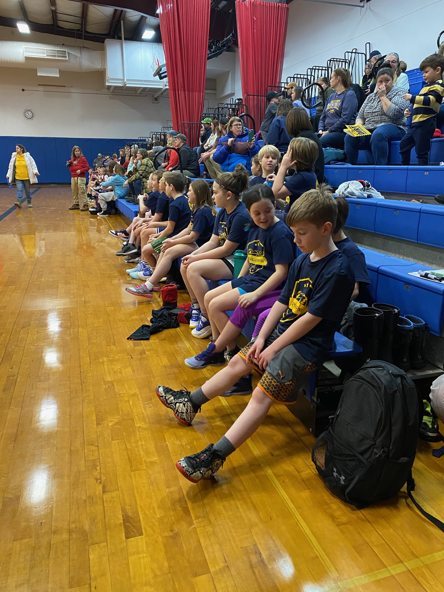 Kids on a basketball bench