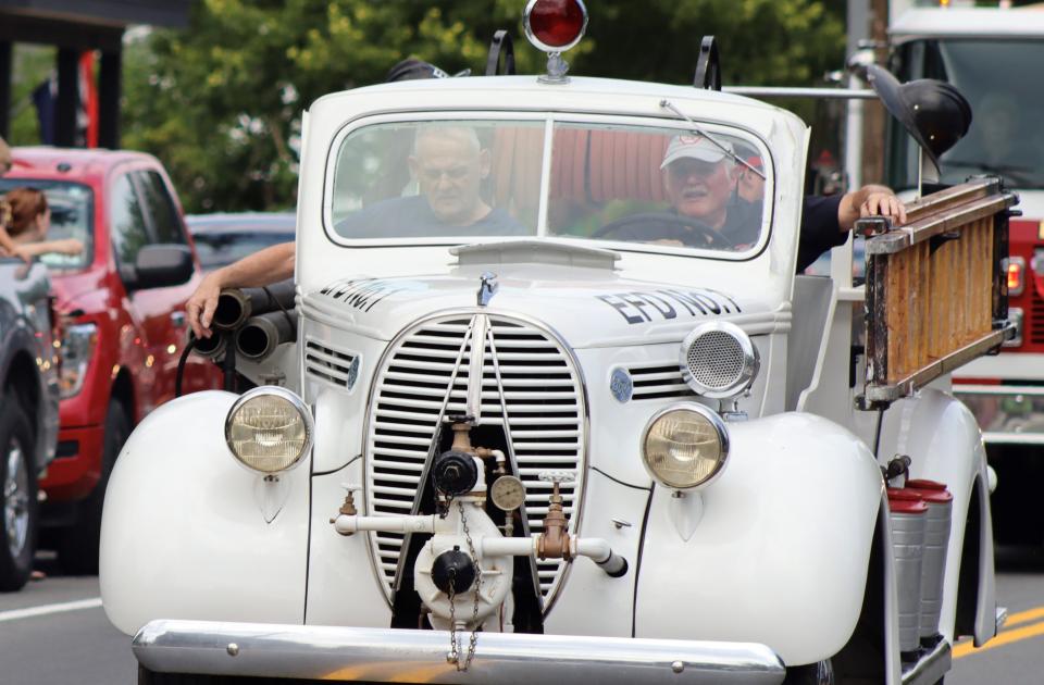 ed and jack in vintage white firetruck