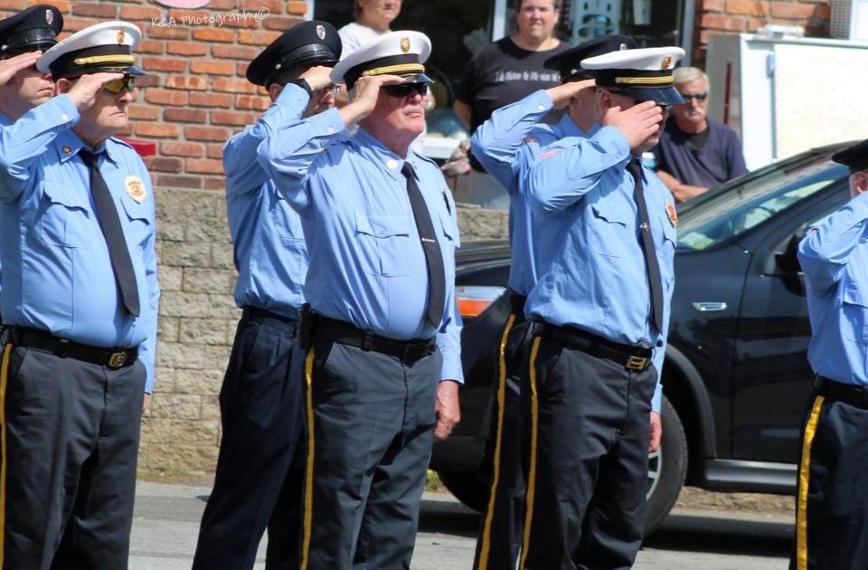 firemen saluting